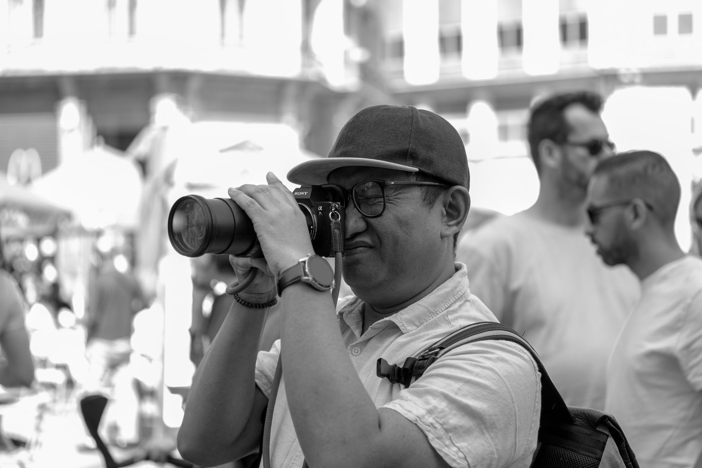 Photographer in action at the Zinneke Parade, Brussels (plate 050)