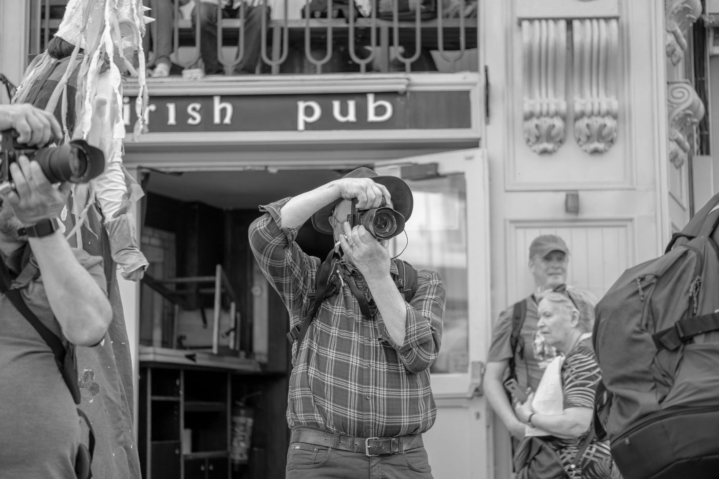 Photographer in action at the Zinneke Parade, Brussels (plate 052)