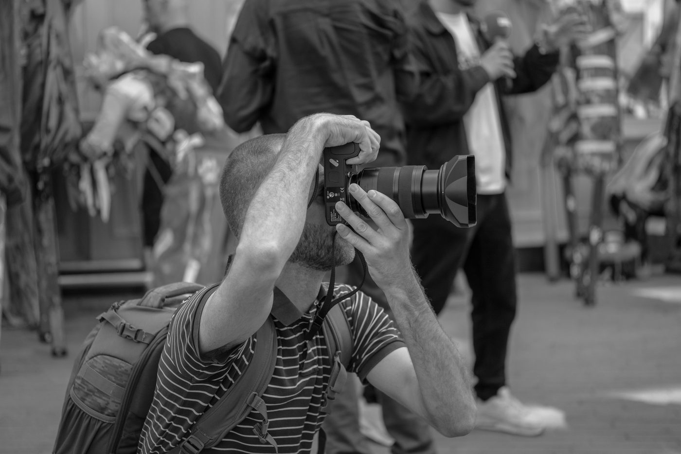 Photographer in action at the Zinneke Parade, Brussels (plate 053)