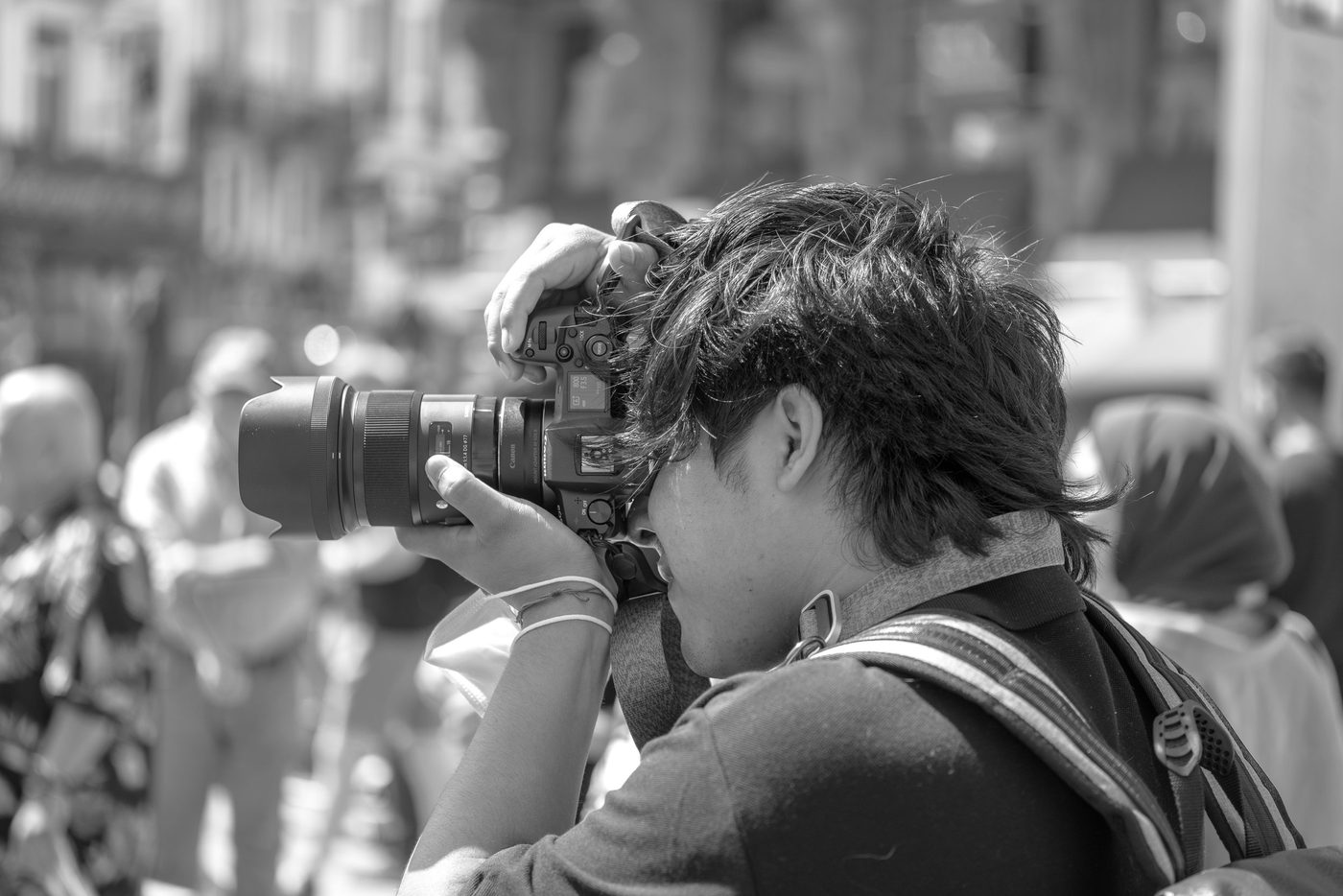 Photographer in action at the Zinneke Parade, Brussels (plate 056)