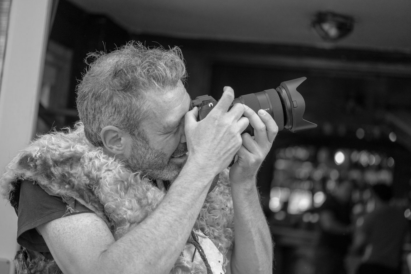 Photographer in action at the Zinneke Parade, Brussels (plate 060)