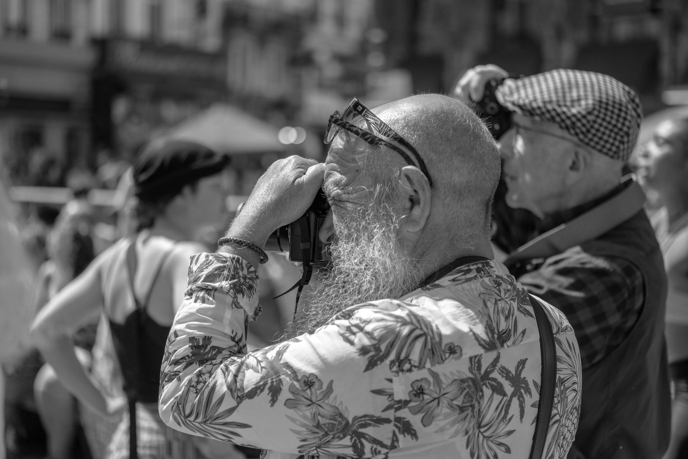 Photographer in action at the Zinneke Parade, Brussels (plate 062)