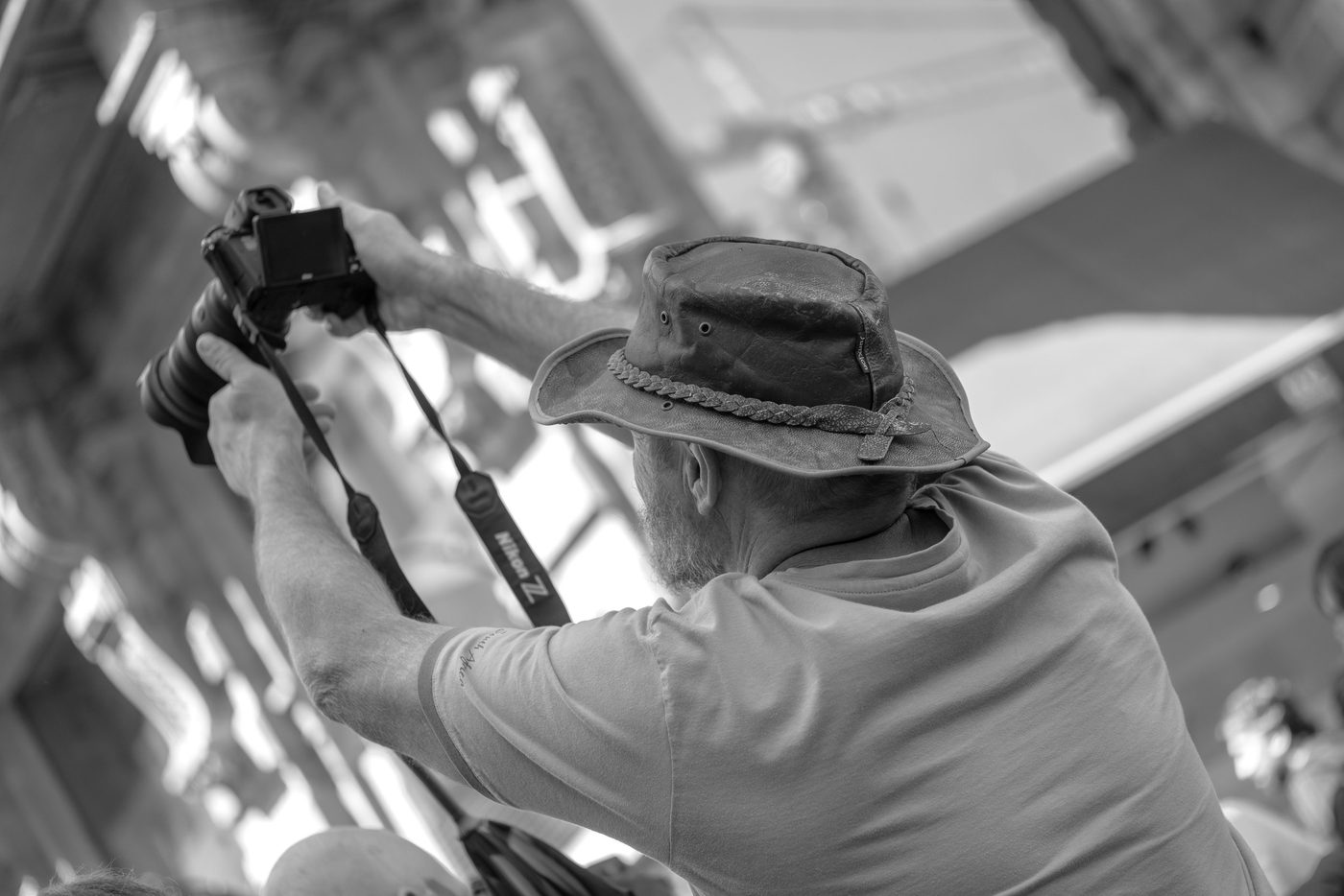 Photographer in action at the Zinneke Parade, Brussels (plate 063)