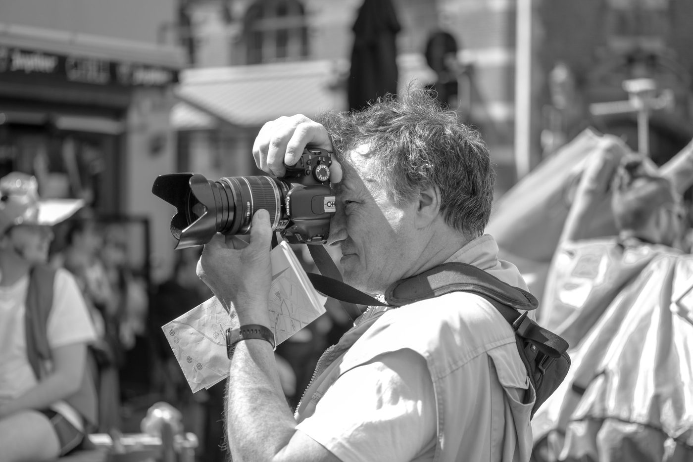 Photographer in action at the Zinneke Parade, Brussels (plate 064)