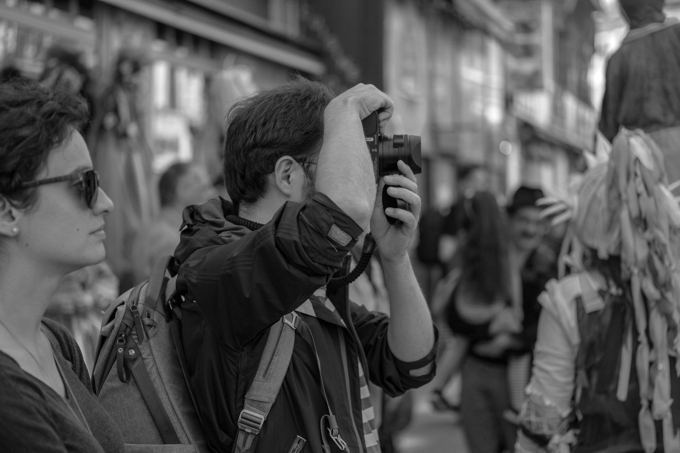 Photographer in action at the Zinneke Parade, Brussels (plate 073)