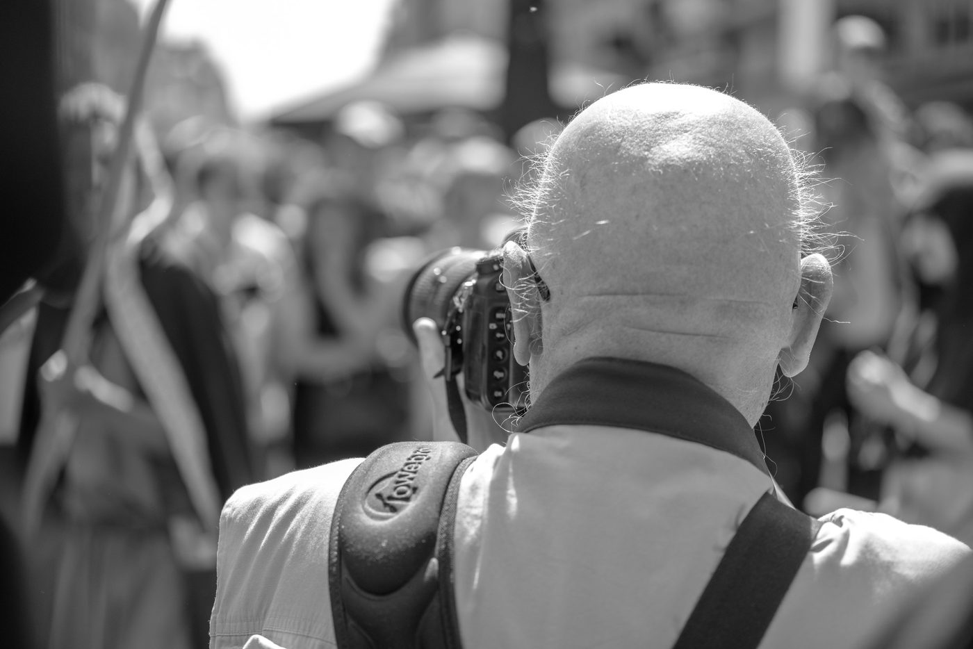 Photographer in action at the Zinneke Parade, Brussels (plate 074)
