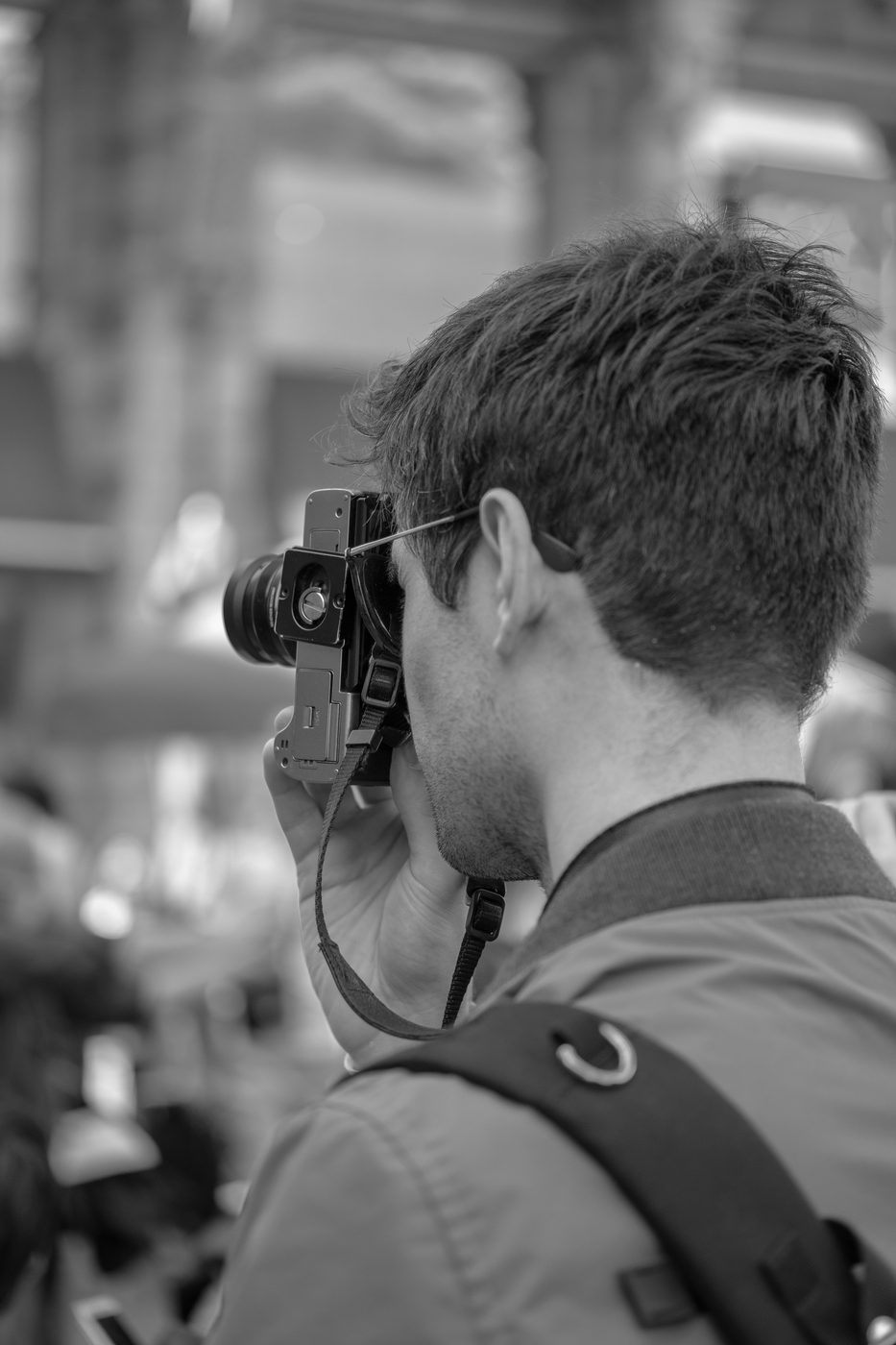 Photographer in action at the Zinneke Parade, Brussels (plate 077)