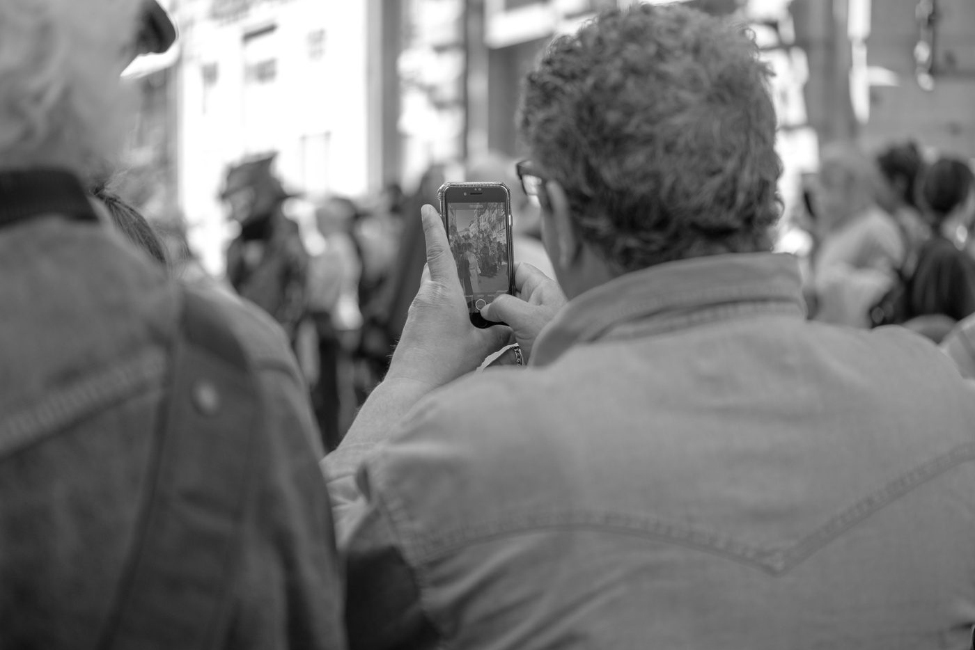 Photographer in action at the Zinneke Parade, Brussels (plate 078)