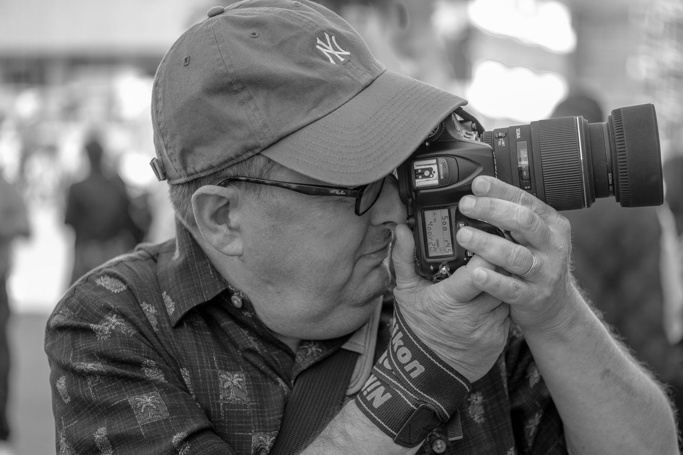 Photographer in action at the Zinneke Parade, Brussels (plate 079)
