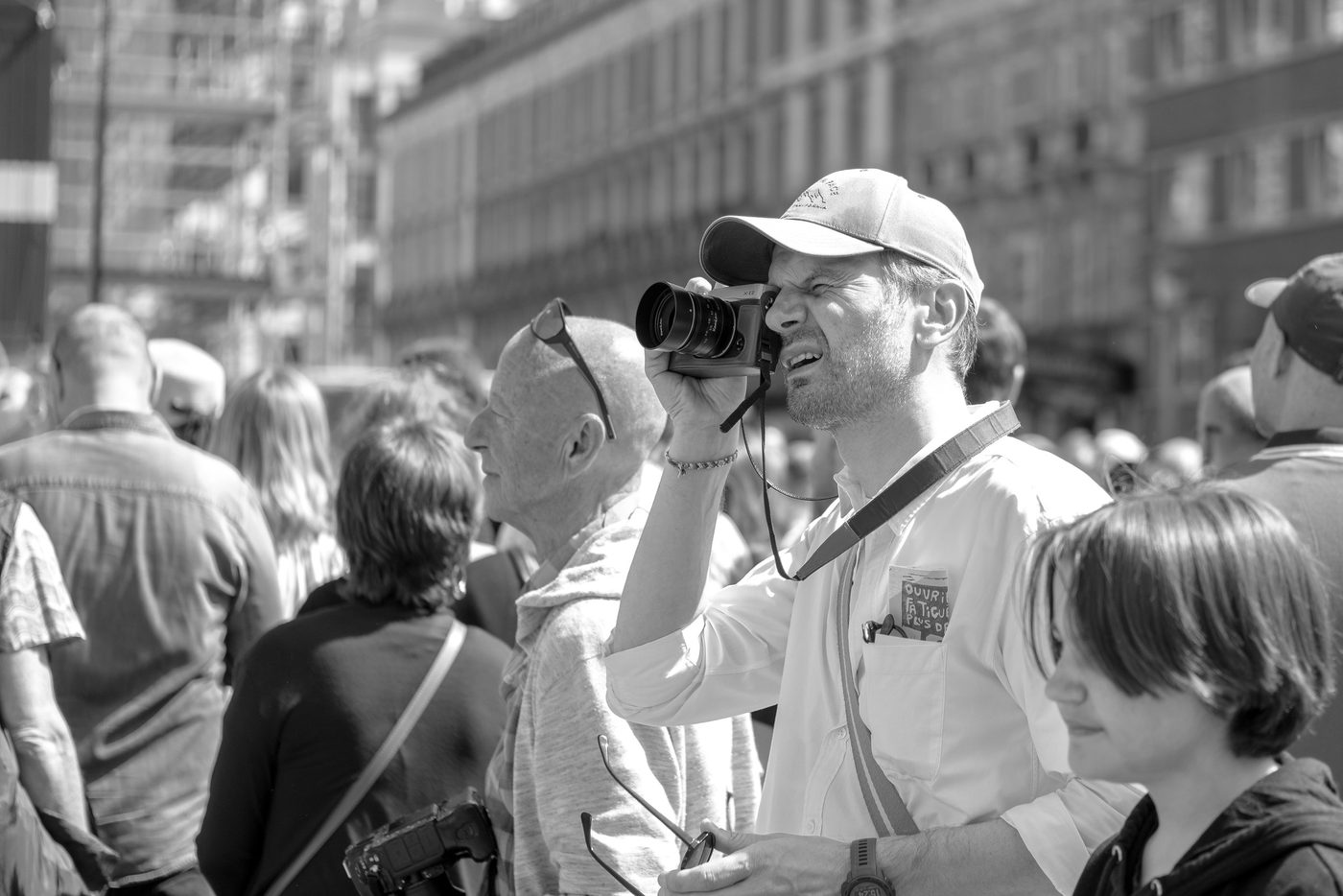 Photographer in action at the Zinneke Parade, Brussels (plate 081)