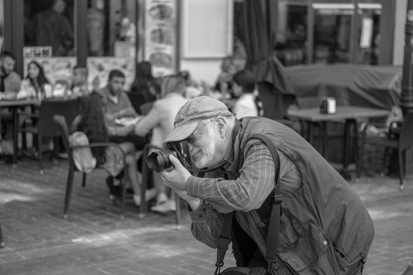 Photographer in action at the Zinneke Parade, Brussels (plate 083)