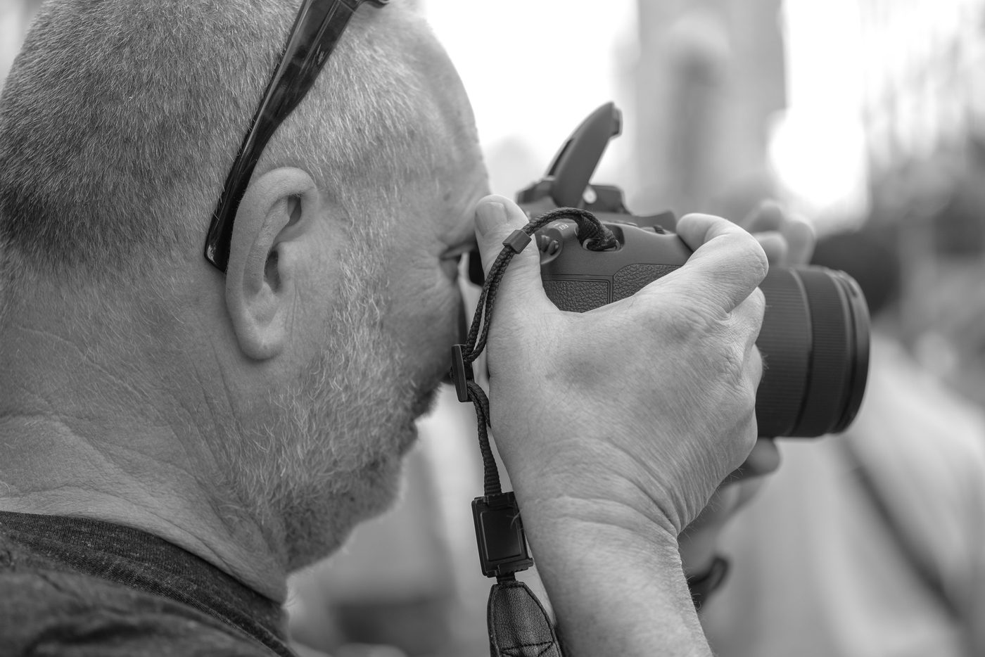 Photographer in action at the Zinneke Parade, Brussels (plate 086)