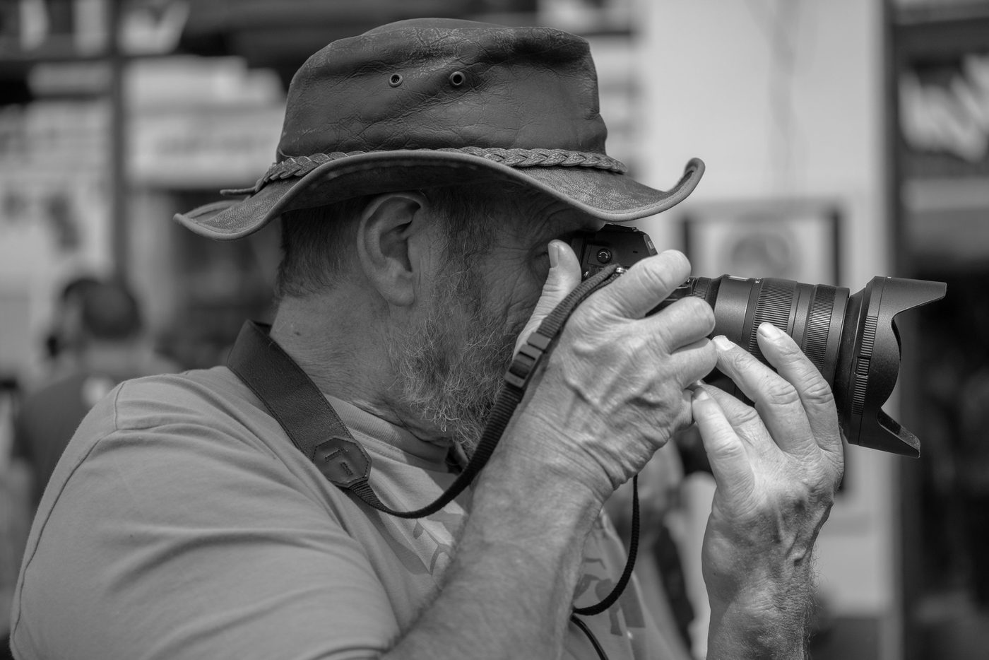 Photographer in action at the Zinneke Parade, Brussels (plate 090)
