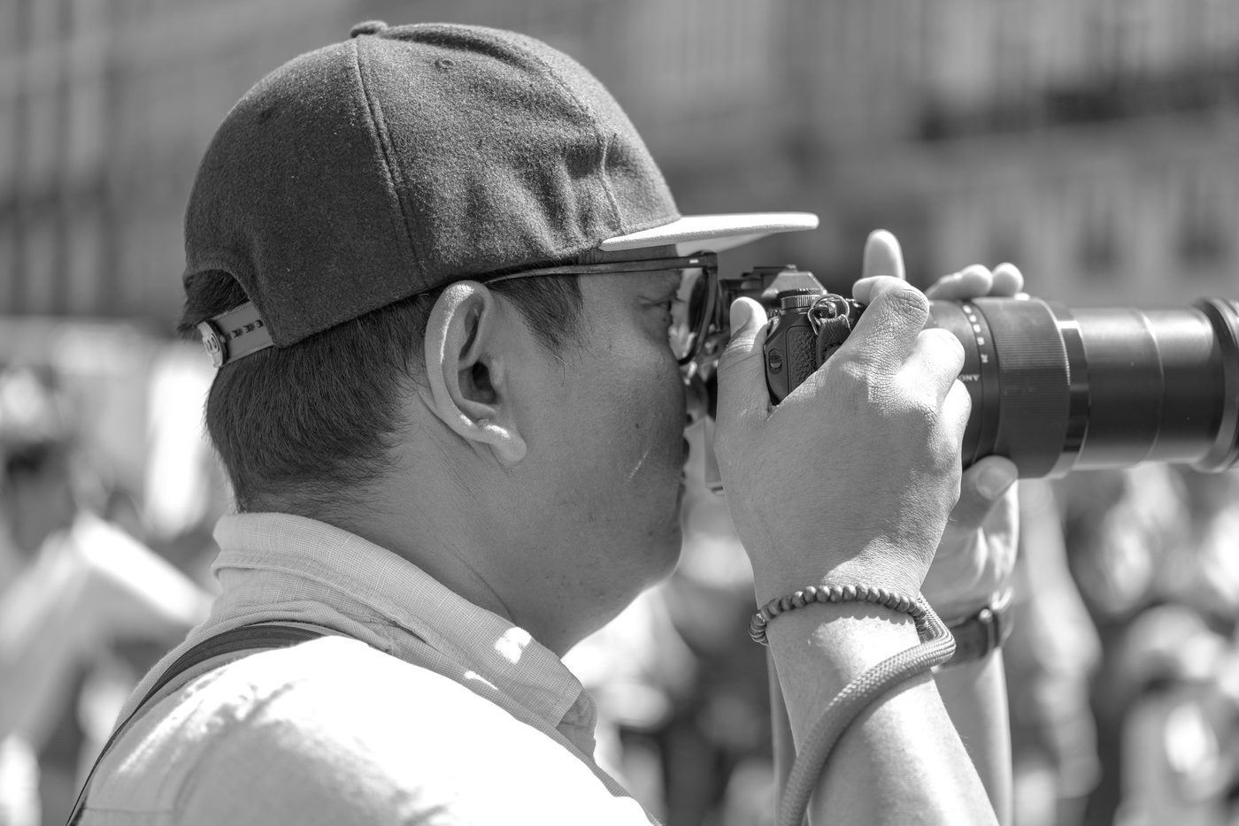 Photographer in action at the Zinneke Parade, Brussels (plate 092)