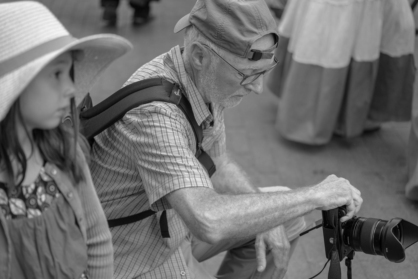Photographer in action at the Zinneke Parade, Brussels (plate 094)