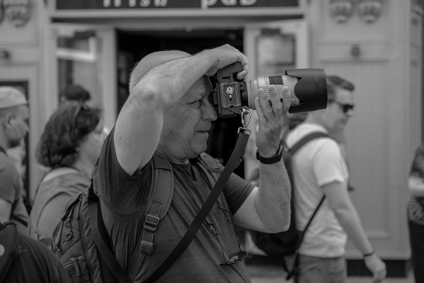 Photographer in action at the Zinneke Parade, Brussels (plate 095)