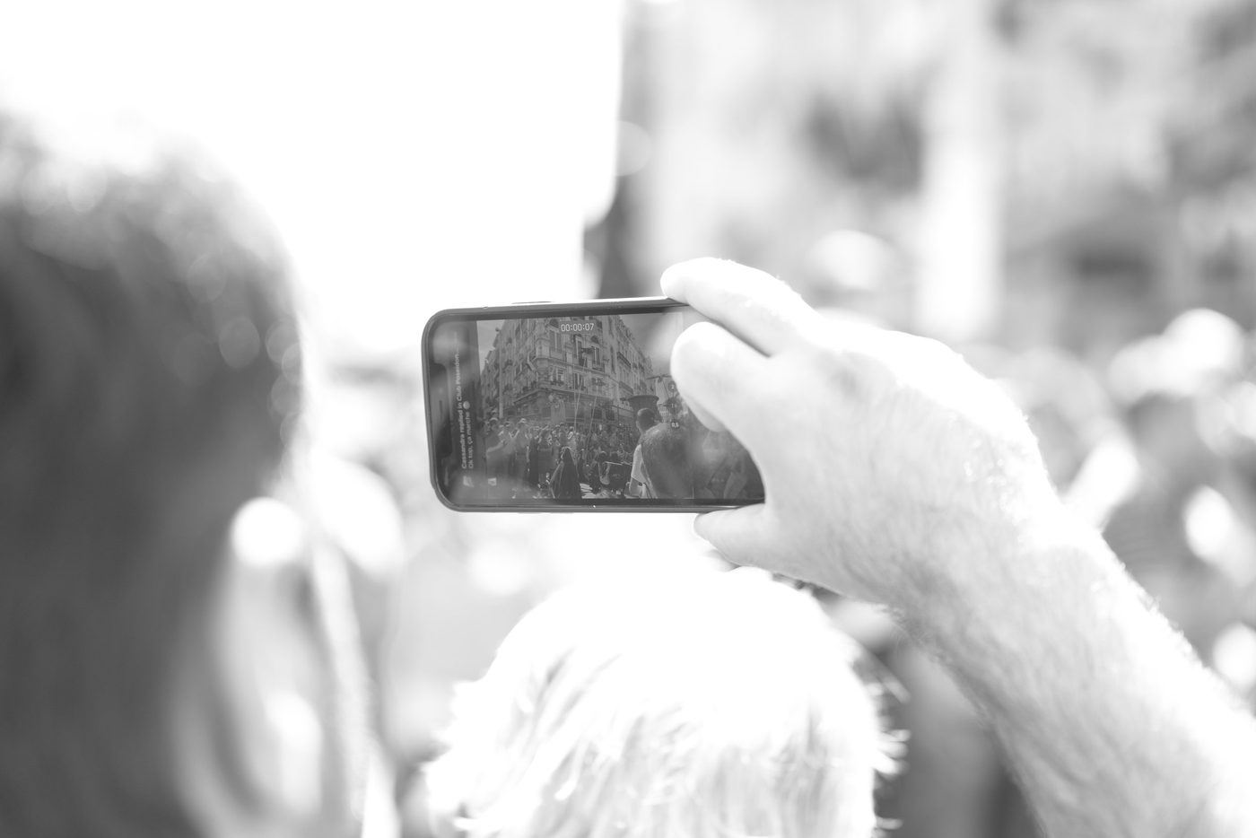Photographer in action at the Zinneke Parade, Brussels (plate 096)