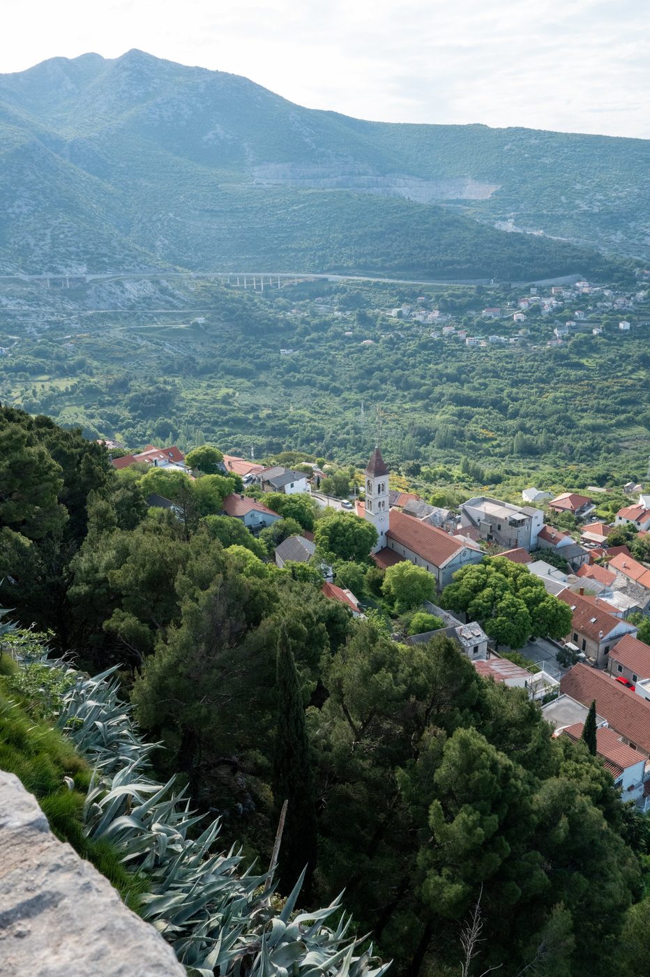 High-angle view of the red rooftops and the village bell tower, Trogir