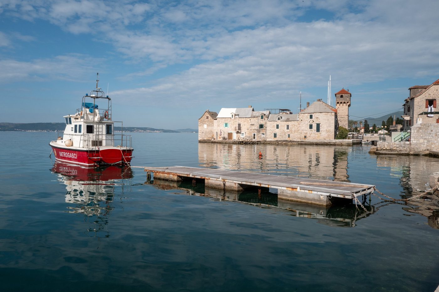 Floating pontoon in front of the old buildings by the water, Trogir