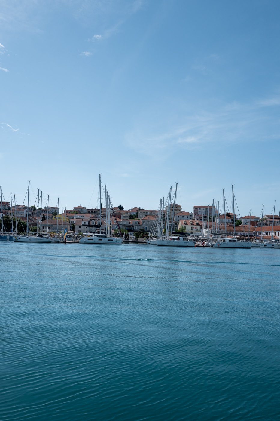 Forest of sailboat masts facing the seafront houses, Trogir