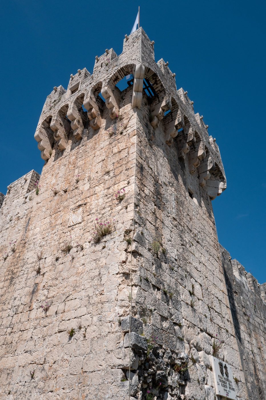 Crenellated tower of the Kamerlengo fortress seen from below, Trogir