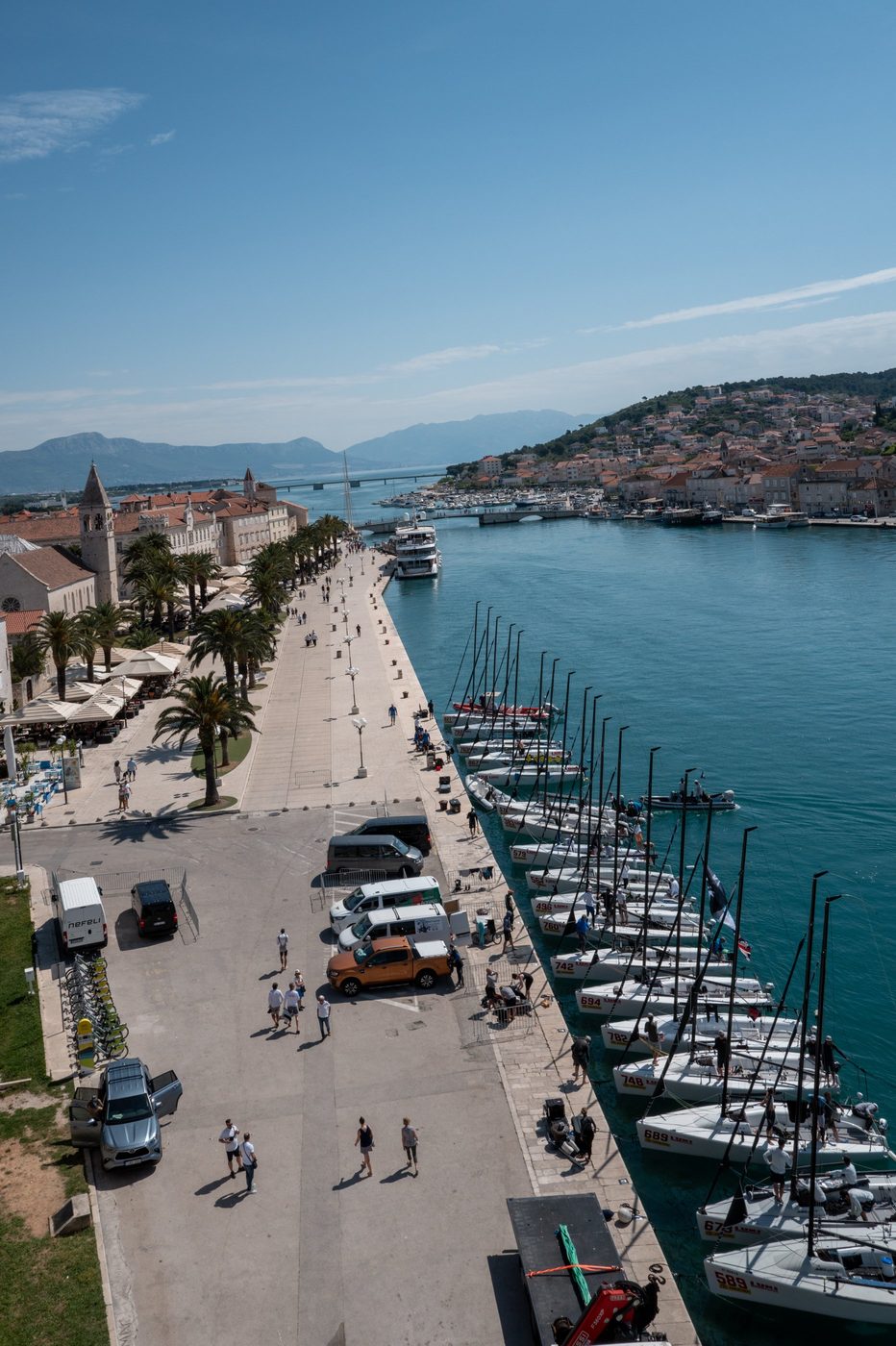 Aerial view of the promenade and sailboats moored at the harbor, Trogir