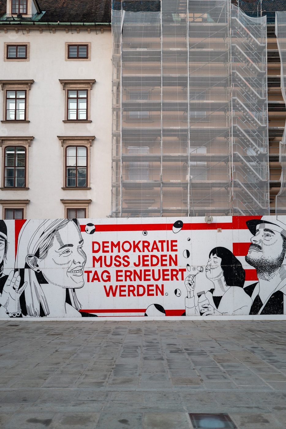 Mural reminding passersby that democracy is renewed every day, Vienna