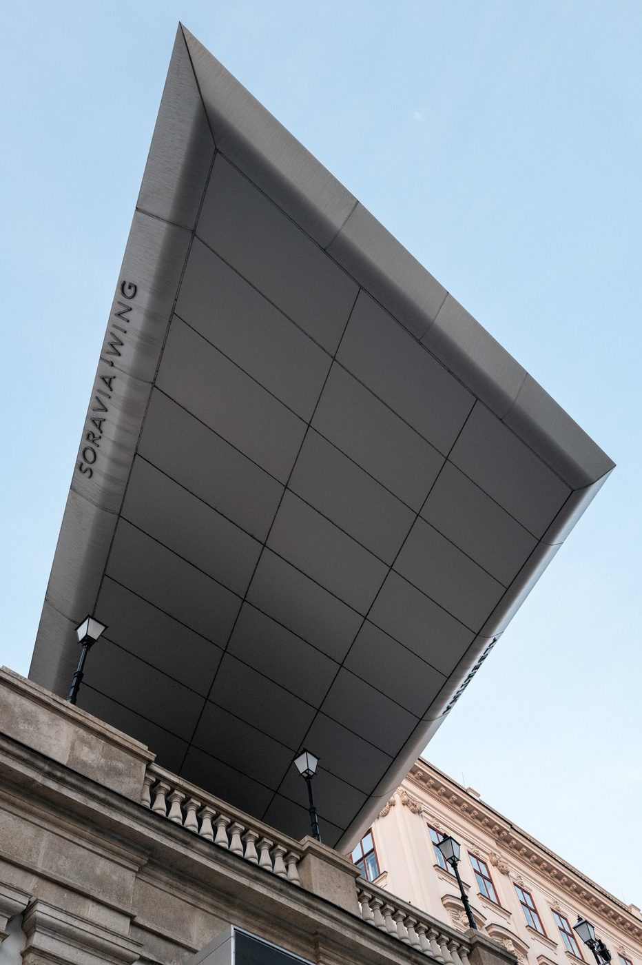 Angular metal canopy of the Soravia Wing standing out against the sky, Vienna