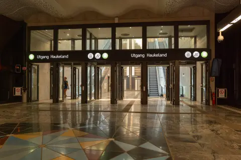The hall of Haukeland station and its star-patterned marble floor, Bergen