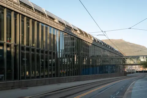 The long glass facade alongside the tram rails, Bergen