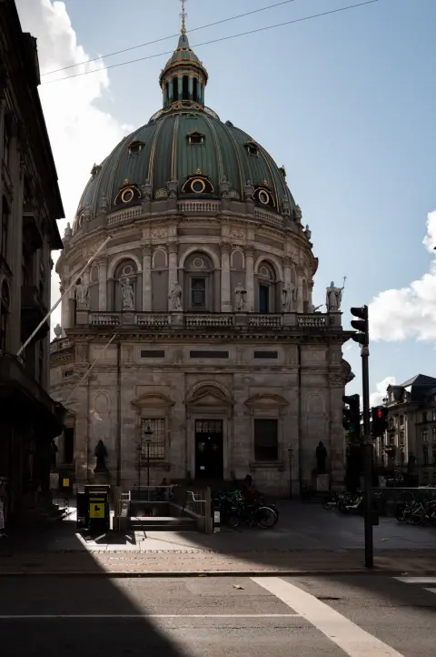 The green dome of the Marble Church at the end of the street, Copenhagen
