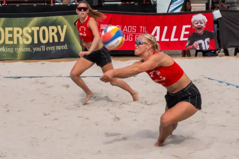 A beach volleyball player diving for a dig, Copenhagen