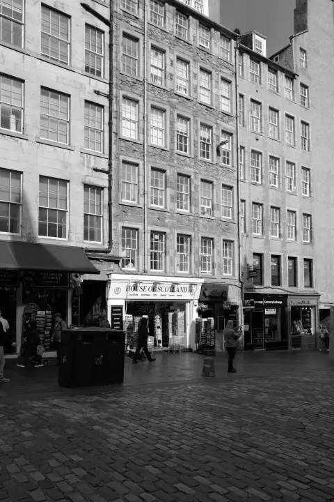 Tall Old Town facades above a cobbled street, Edinburgh