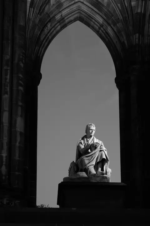 Statue of Walter Scott beneath the arch of the Scott Monument, Edinburgh