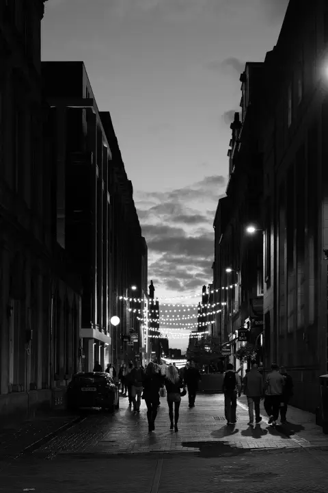 Street at dusk under strings of lights, Edinburgh