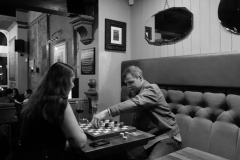 Game of draughts in a pub, Edinburgh