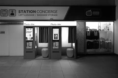 Empty photo booths and left-luggage office in the station, Edinburgh