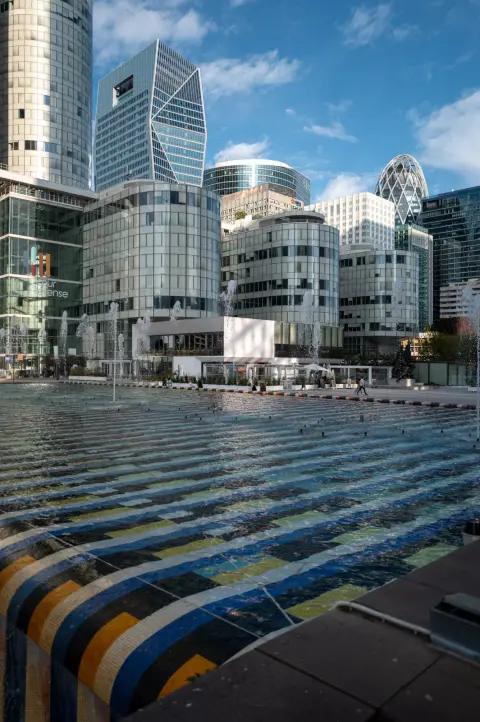 A colourful mosaic pool at the foot of the towers, Paris