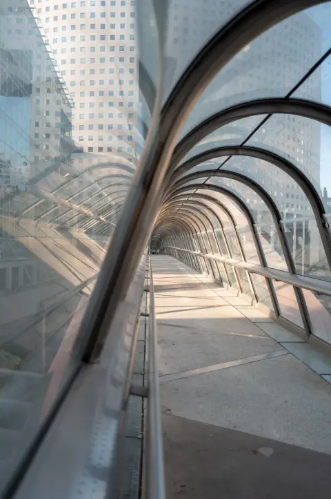 The arches of the glass footbridge seen at an angle, Paris