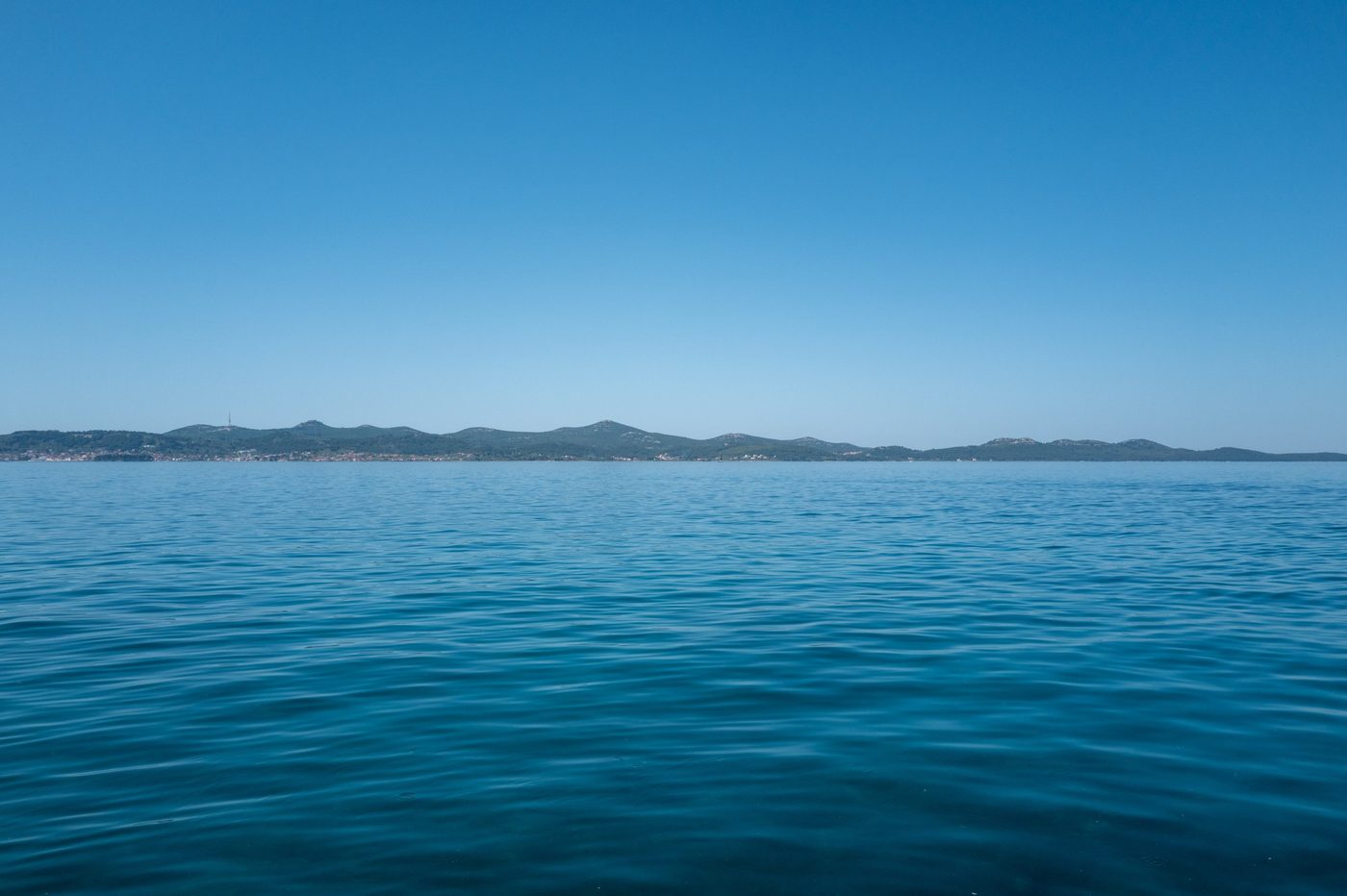 Calm horizon between the sea and the Adriatic coastal hills, Zadar